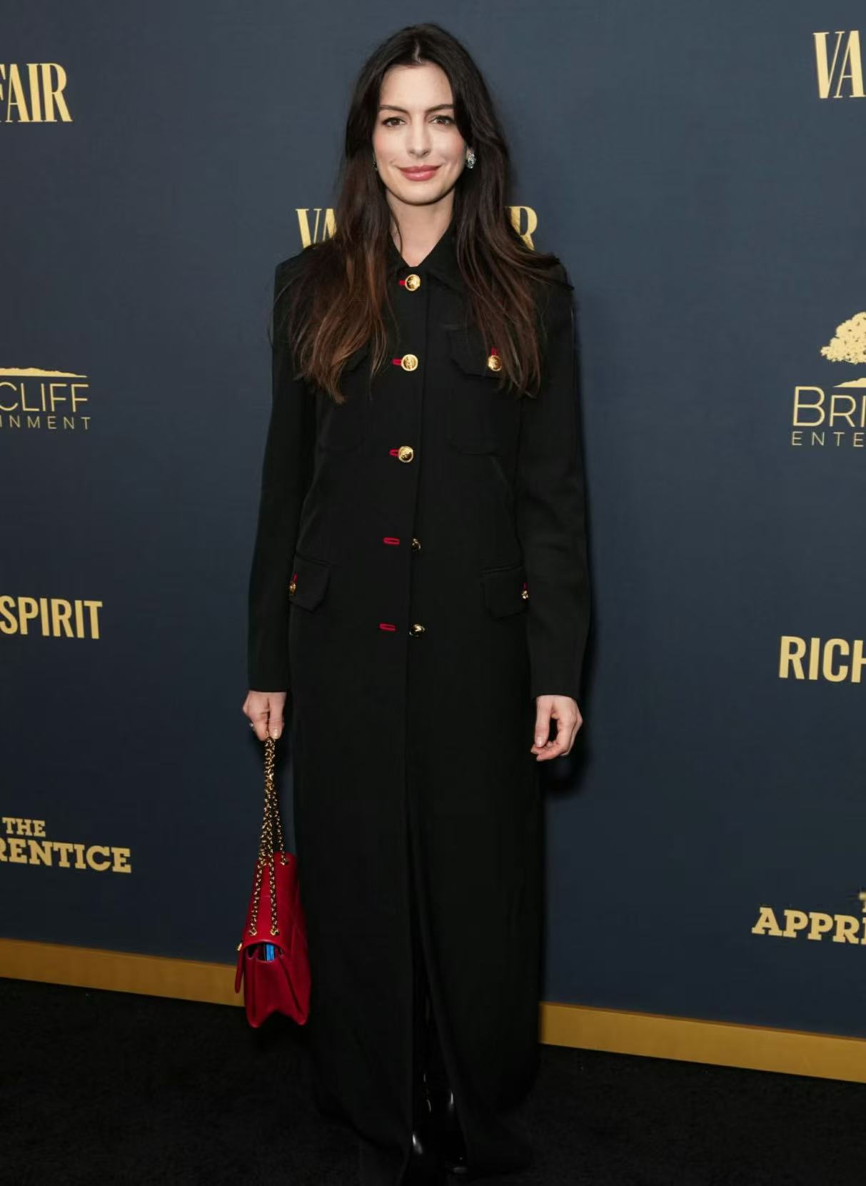 Anne Hathaway long center parted brunette hairstyle