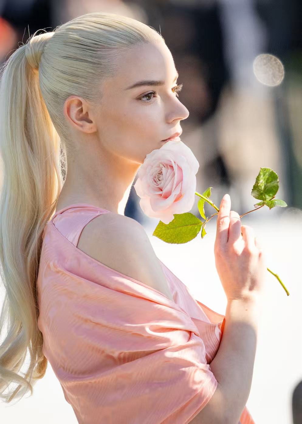 Anya Taylor-Joy sleek high ponytail hairstyle