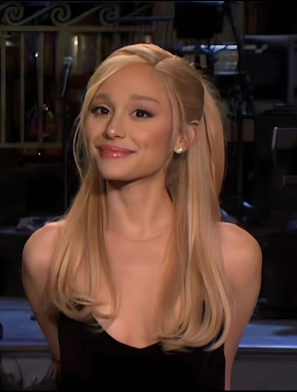 Ariana Grande blonde half up ponytail hairstyle with polished lengths