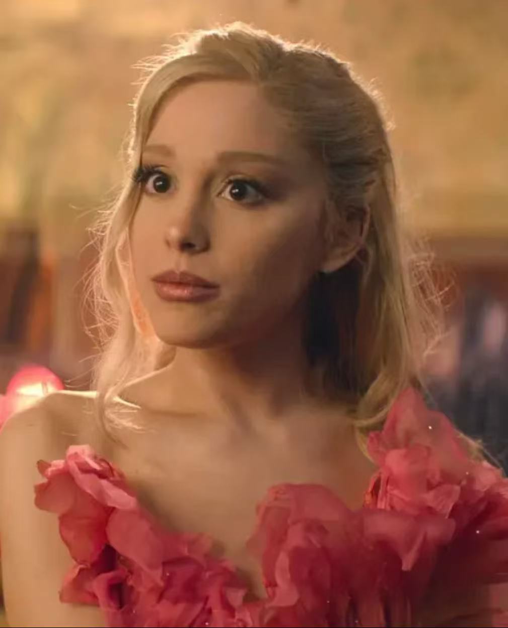 Ariana Grande soft blonde bob hairstyle with face framing pieces