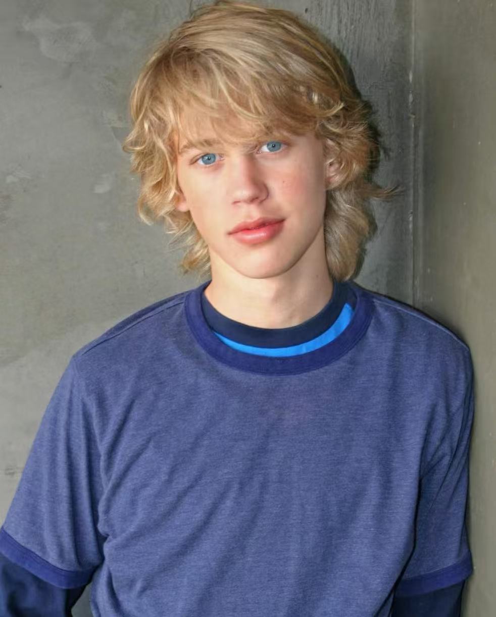 Austin Butler youthful blond surfer layered hairstyle