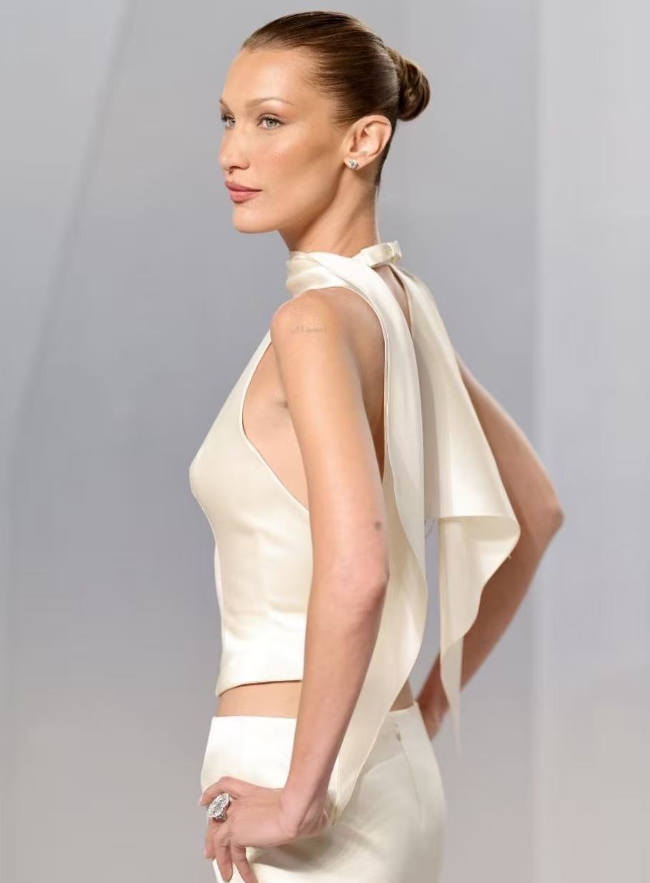 Bella Hadid sleek bun hairstyle with polished side profile