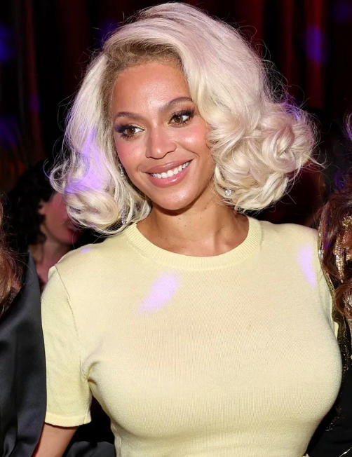 Beyonce inspired retro platinum bob with brushed curls