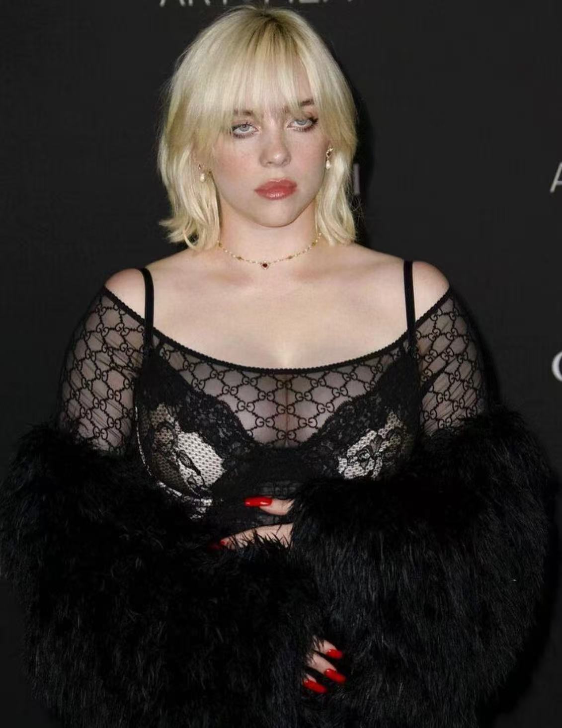 Billie Eilish short blonde bob with bangs hairstyle