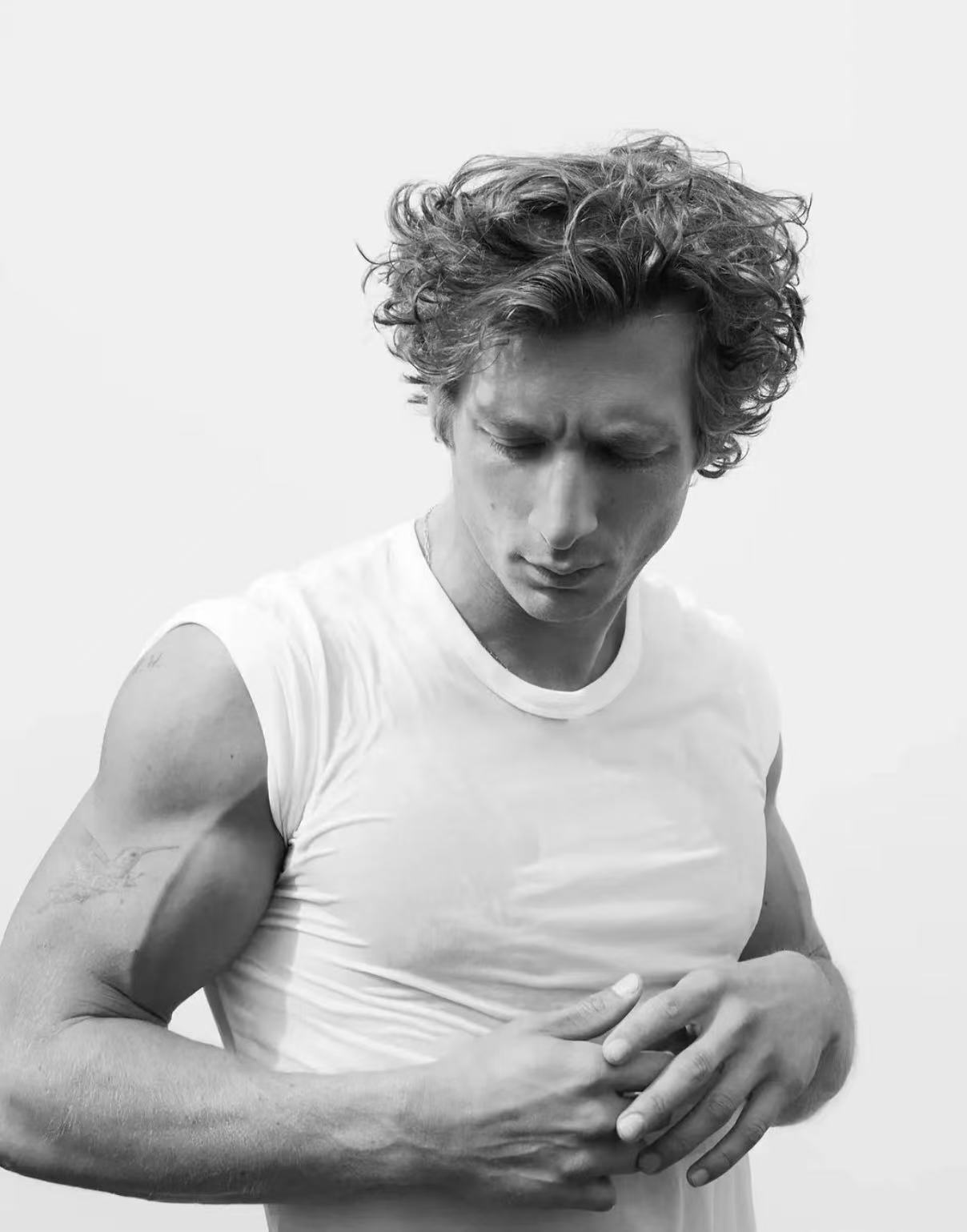 Jacob Elordi black and white messy curly hairstyle