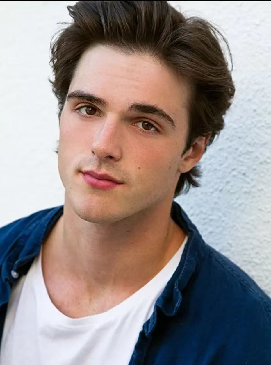 Jacob Elordi brushed back medium hairstyle