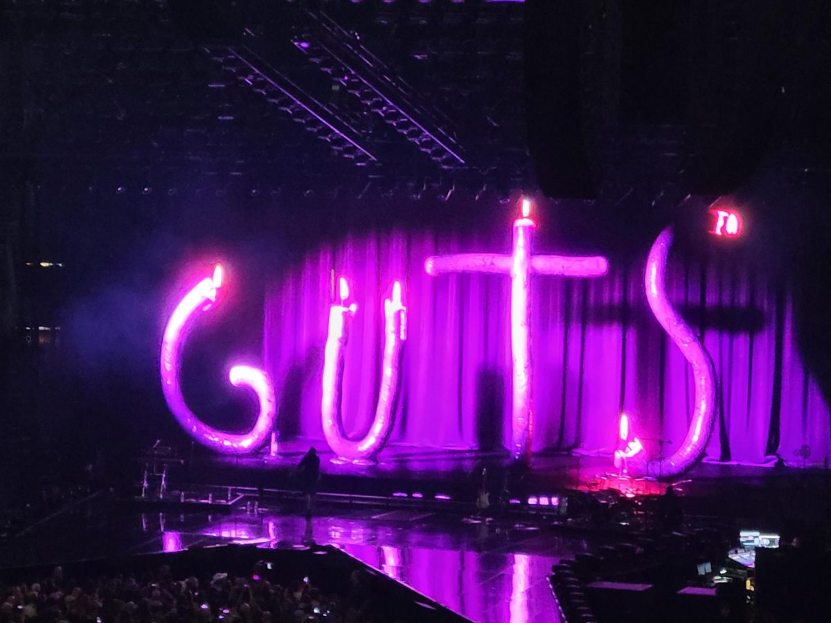 Olivia Rodrigo GUTS Tour purple stage performance