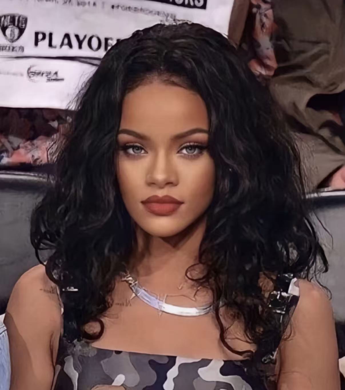 Rihanna inspired black shoulder length waves with center part