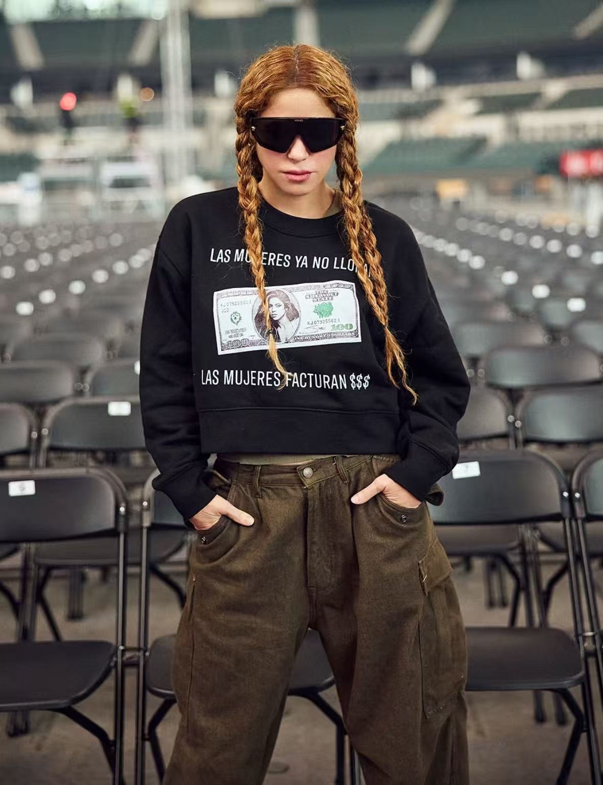 Shakira double braids sporty hairstyle