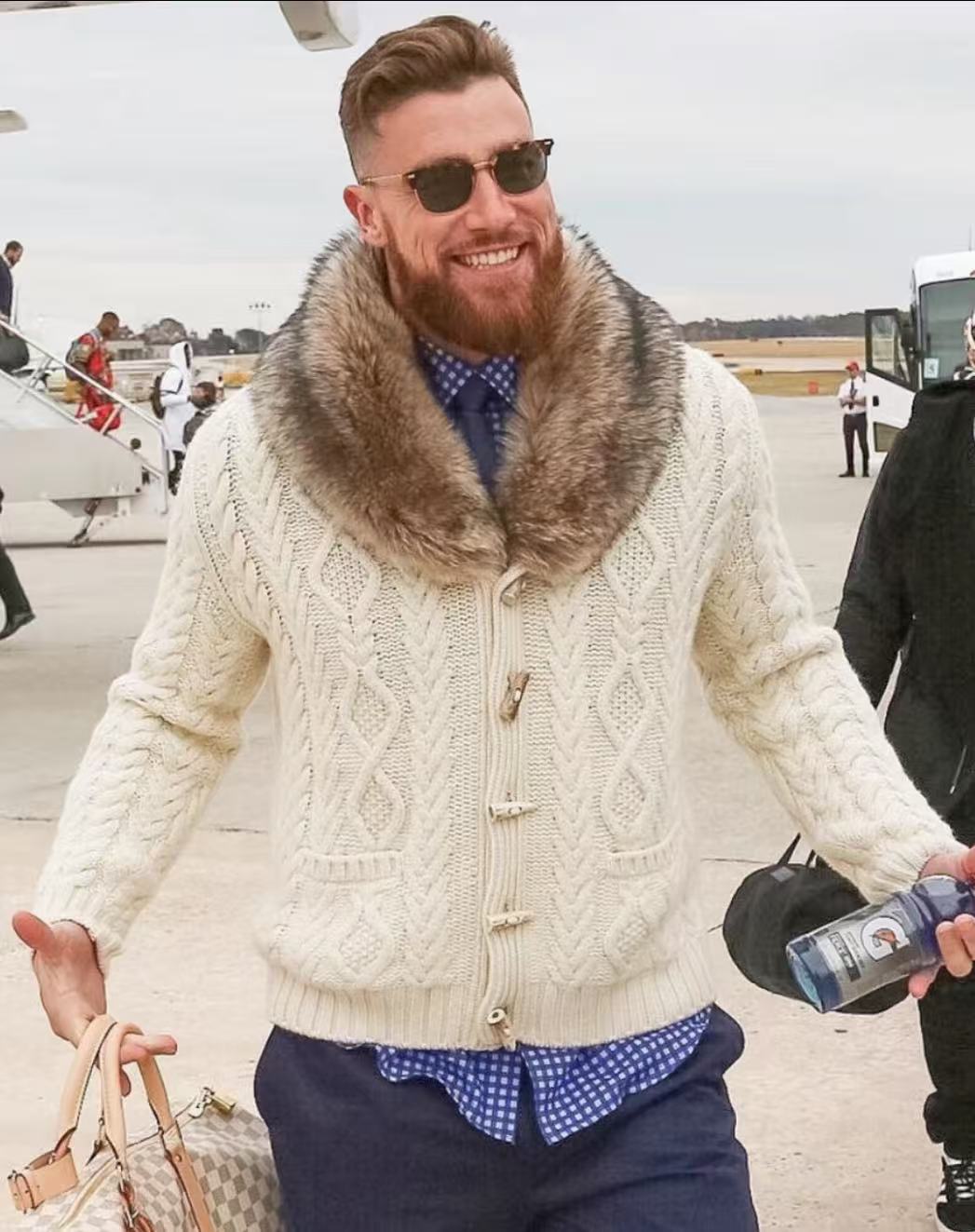 Travis Kelce high fade hairstyle with brushed up top